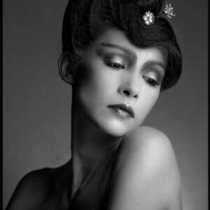 portrait of Cathy Damon with silver flowers black and white fine art photography by photographer Clive Arrowsmith