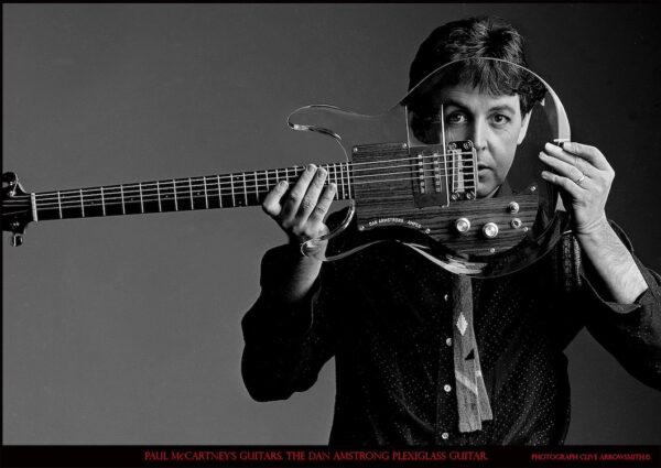 Paul McCartney with his guitar Dan Armstrong black and white fine art photography by photographer Clive Arrowsmith