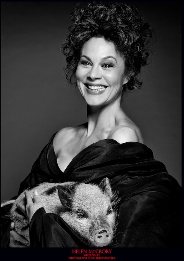 portrait of actress Helen McCrory with a pig black and white fine art photography by Clive Arrowsmith